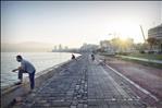 fisherman in izmir bay at dawn